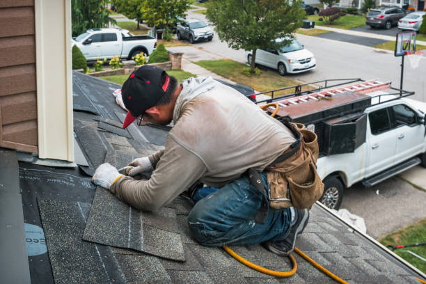 Professional Roof Replacement technician working in Moodus, CT